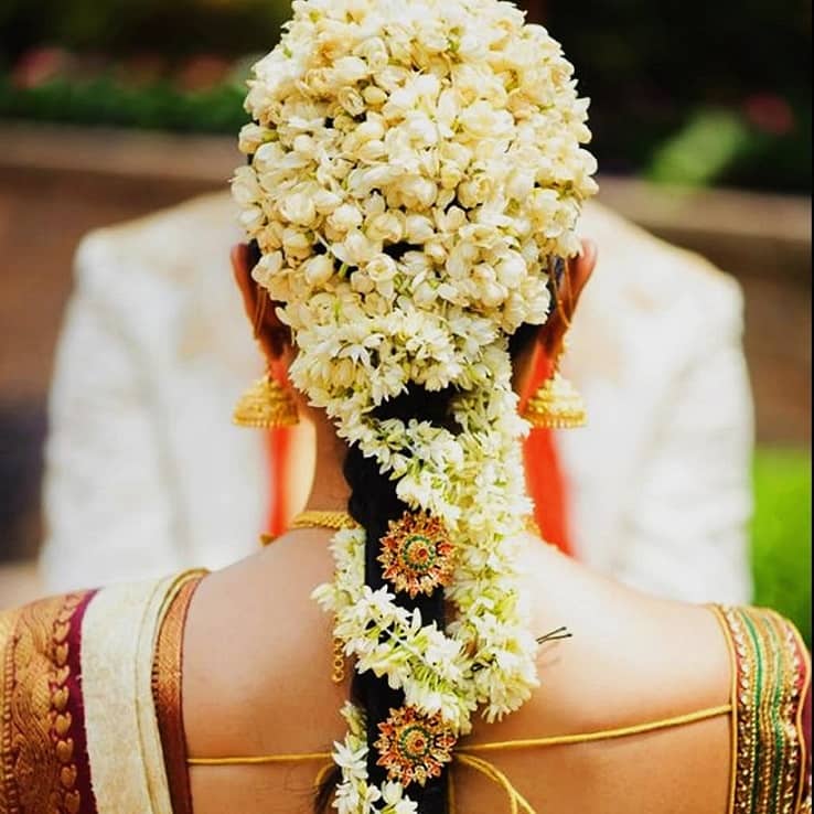 50 Gajra Hairstyle Ideas for Bride this Wedding Season  Bridal hairdo  Hair style on saree Bridal hair buns