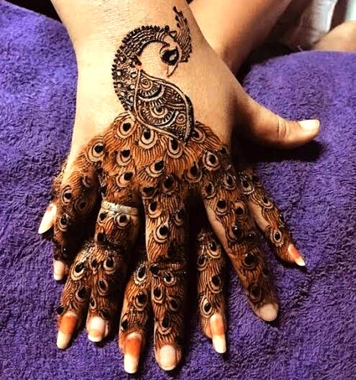 Arabic mehndi pattern with peacock