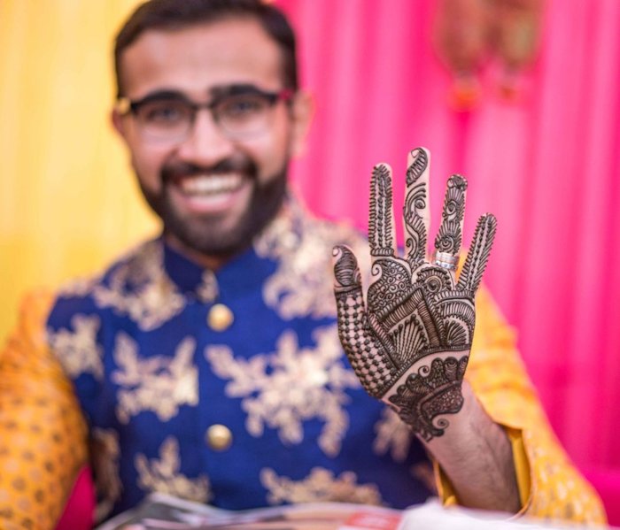 Mehndi designs for grooms are trending with many men loving the idea of having fun at this ritual.