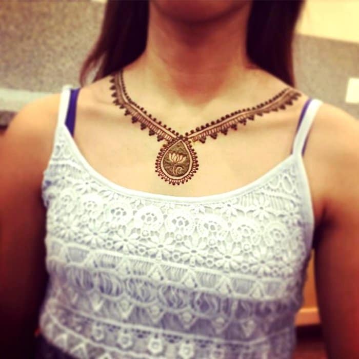 A delicate henna necklace | Henna neck, Henna tattoo designs, Henna