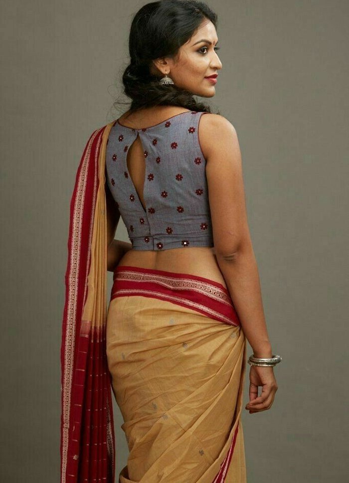 Share more than 169 sleeveless saree blouse neck designs super hot ...