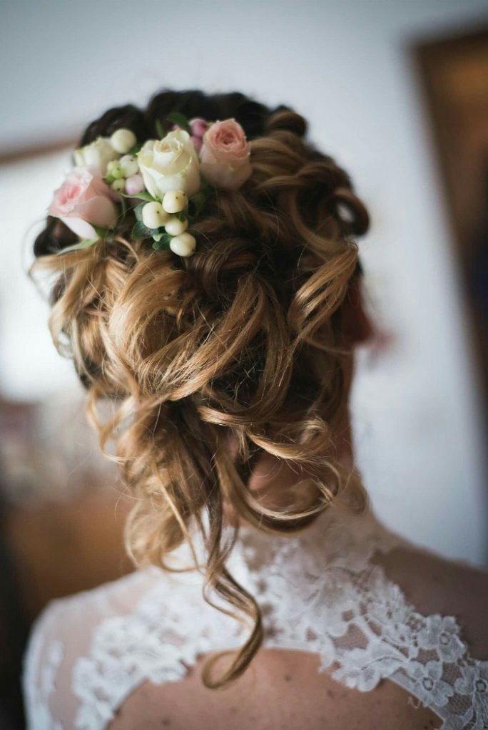 Premium Photo  Young beautiful bride hairstyle with fresh flowers 