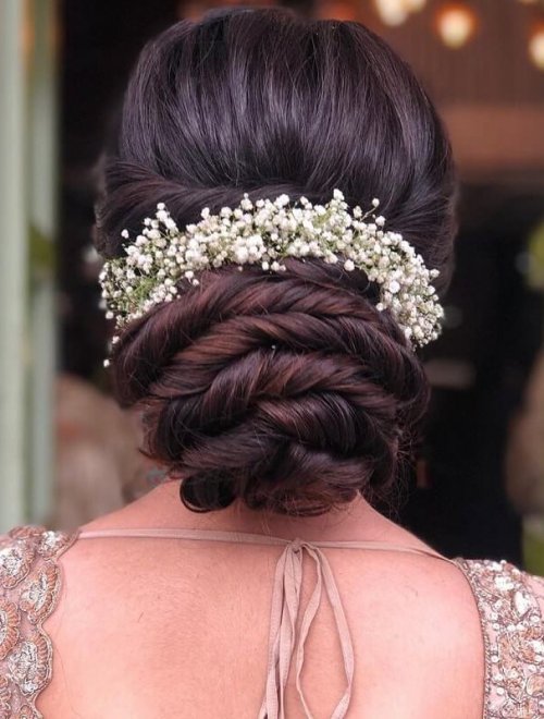 Premium Photo | Close-up bride frome back with elegance wedding updo  hairstyle for medium brown hair with hairpin