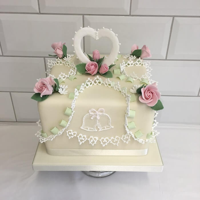 An Intricately Designed Anniversary Cake With Frills﻿
