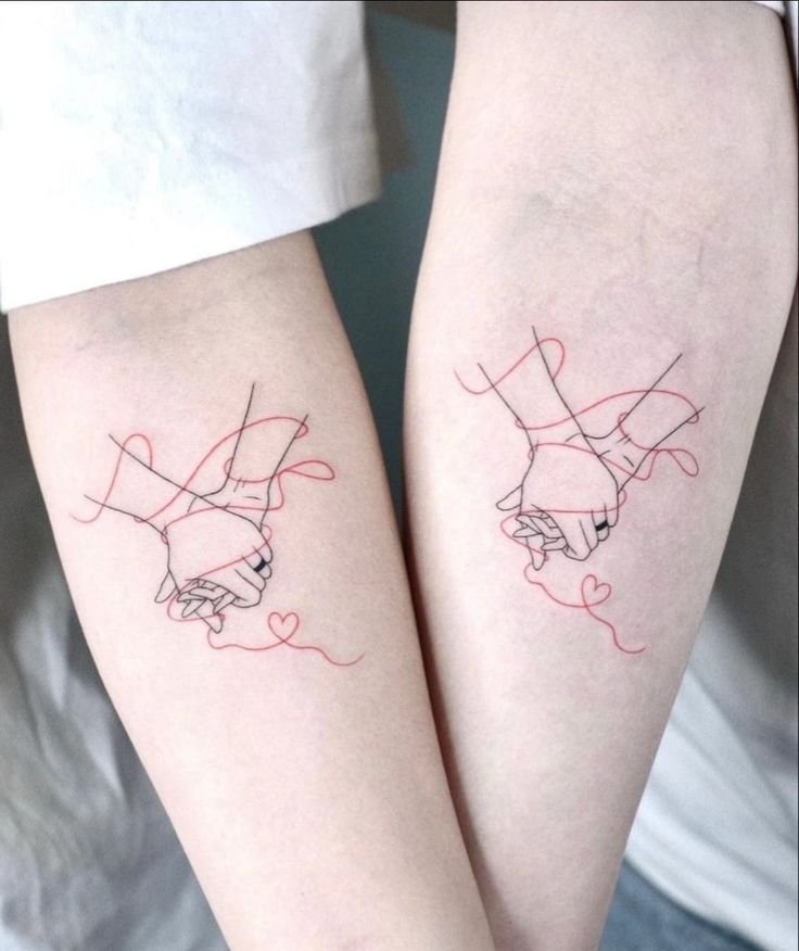 Couple Tattoos Featuring Two Hands Touching